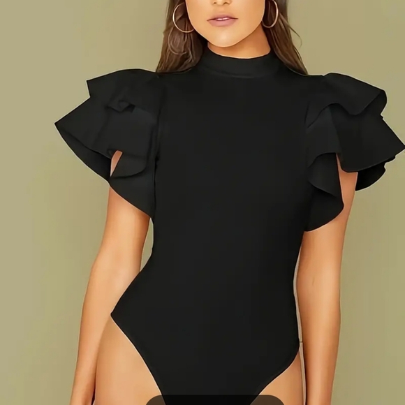 Gorgeous black knit bodysuit with layers of fabric pieces for sleeves. Snap clos - Picture 4 of 4